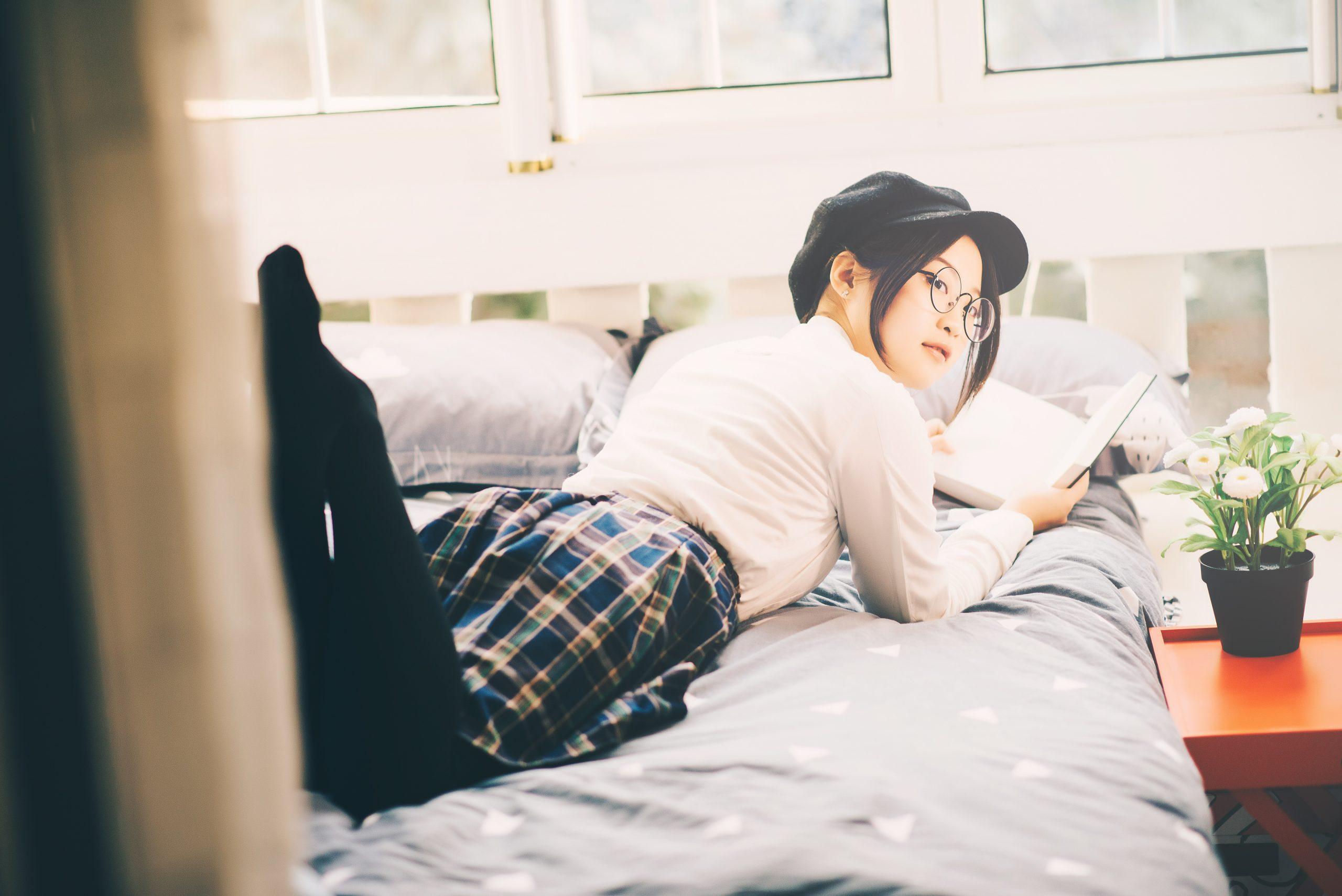 woman reading in bed 3